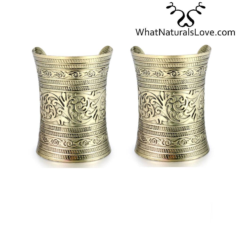 Set of two gold hair cuffs with intricate patterns, perfect for holding locs, Sisterlocks, and braids. Stylish and non-damaging hair accessory.