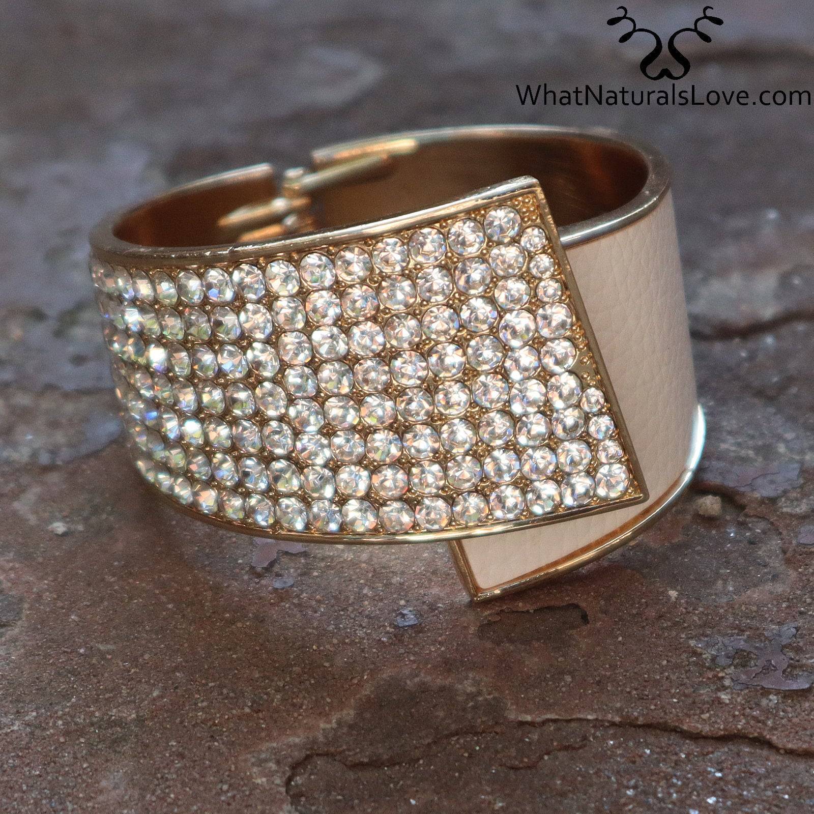 Stylish rhinestone hair cuff with gold-tone details on a textured surface. A perfect accessory for securing locs, dreadlocks, and braids.