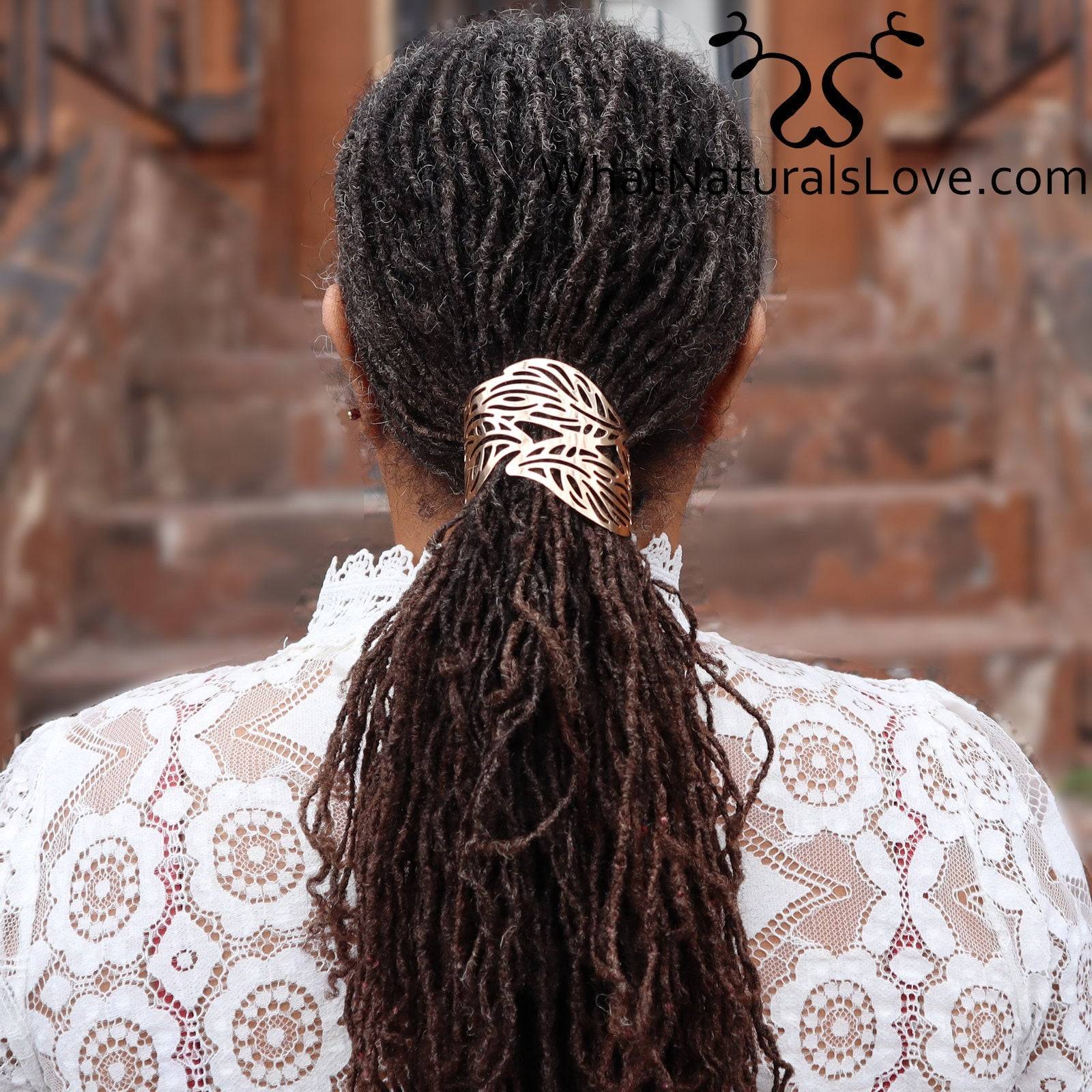 Elegant gold leaf hair cuff securing long locs in a ponytail, perfect for Sisterlocks, dreadlocks, and Memorial Day 2024 styling.