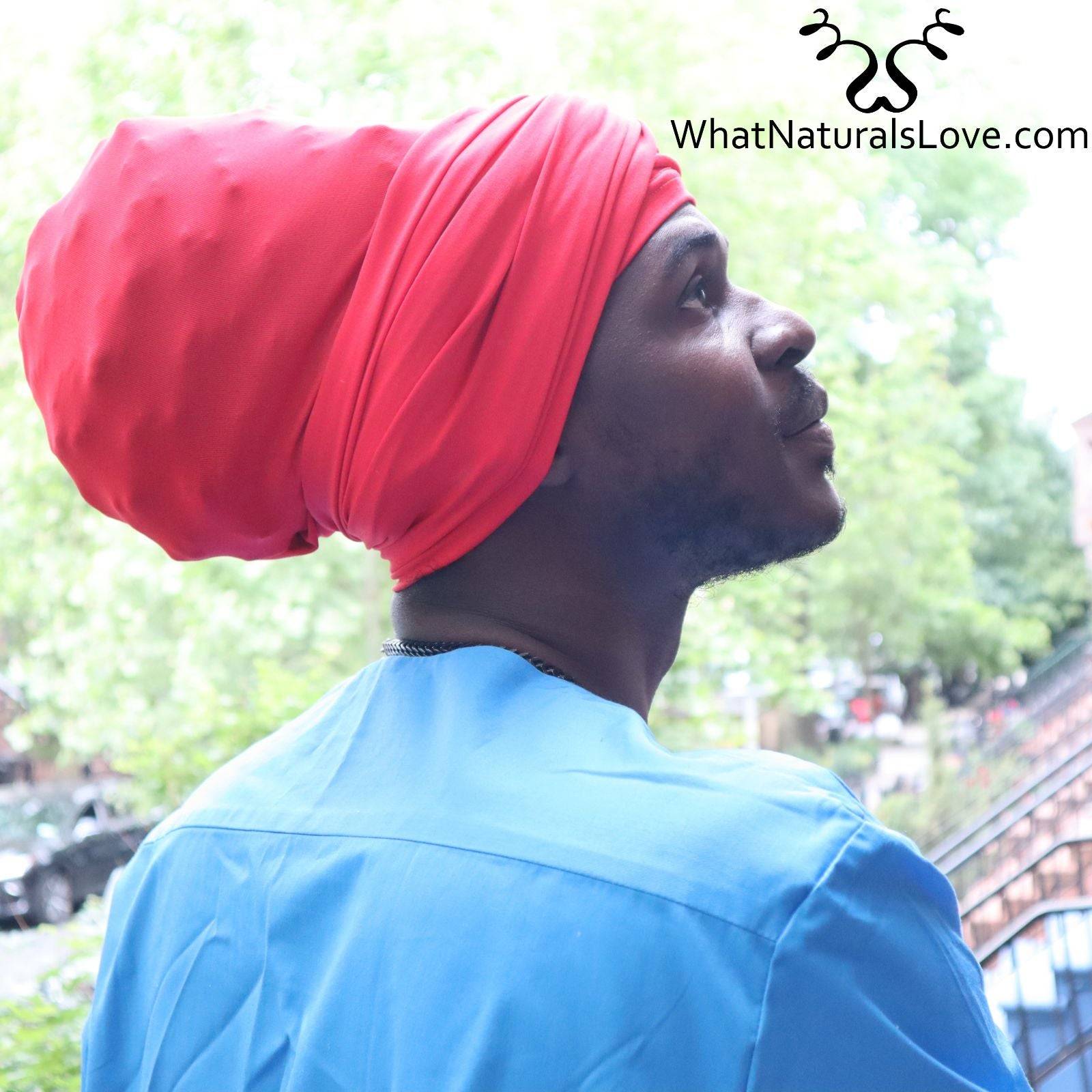 Man wearing a red tube headwrap for locs, sisterlocks, and dreadlocks. A stylish and protective headwear option for men.