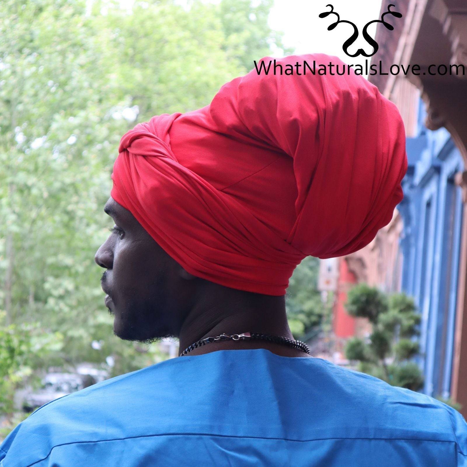 Man wearing a red tube headwrap for locs, sisterlocks, and dreadlocks. A stylish and protective headwear option for men.
