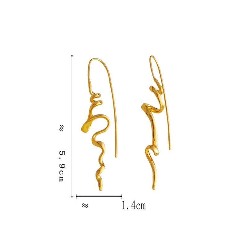 Gouden Flow Oorbellen – Elegante Organische Spiralen