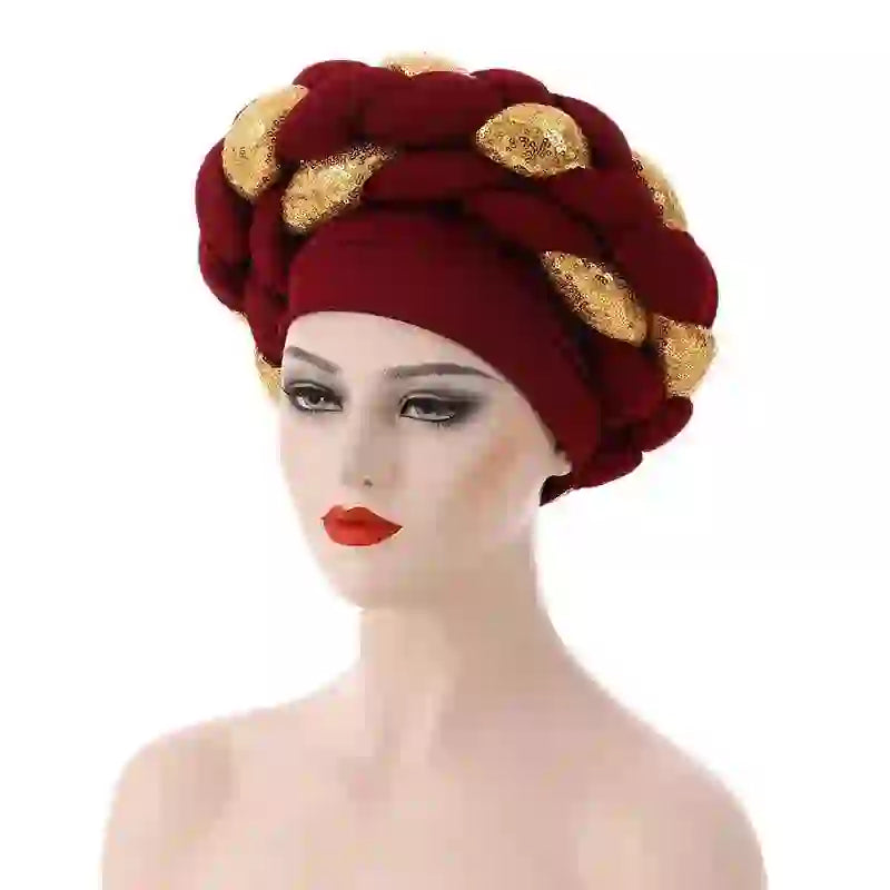 Yellow Gele African turban with gold sequin embellishments for women. A vibrant and stylish headwrap for special occasions.