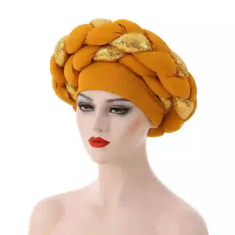 White Gele African turban for women with braided design and gold bead embellishments. Elegant headwrap for traditional and modern styling.