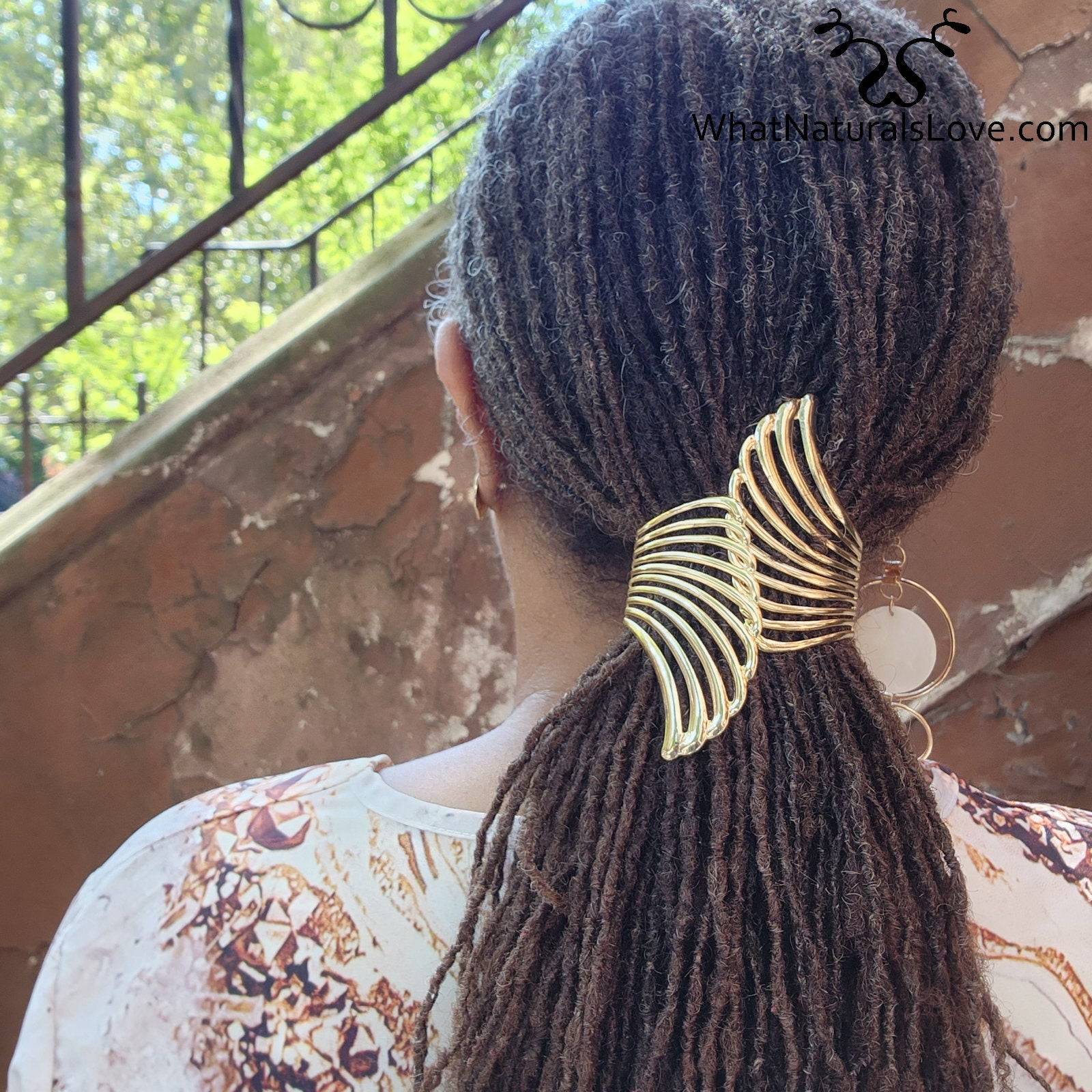 Close-up of Gold Aurora Wing Cuff in locs, highlighting its elegant wing-shaped design. Ideal for styling dreadlocks, sisterlocks, and braids.