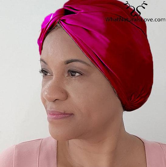 Silk Bonnet Amara De Luxe in vibrant red, designed with a twisted front. Made from 100% Mulberry Silk to protect natural hair and locs.