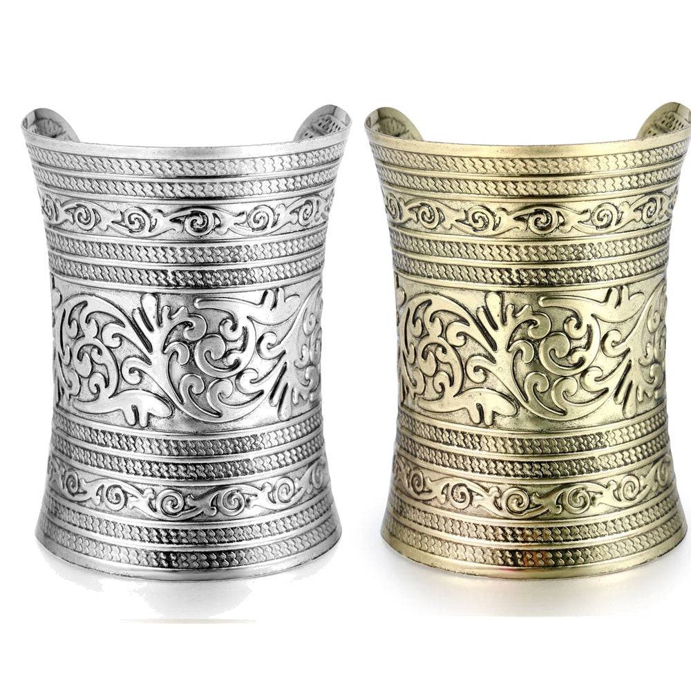 Gold and silver hair cuffs with intricate carvings, ideal for dreadlocks, Sisterlocks, and braids. Stylish and non-damaging hair accessories.