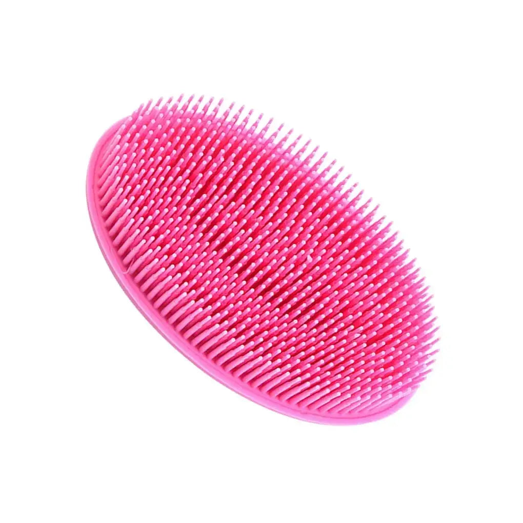 Pink silicone loc lint remover brush with soft bristles, designed to remove lint from locs without causing breakage or damage.