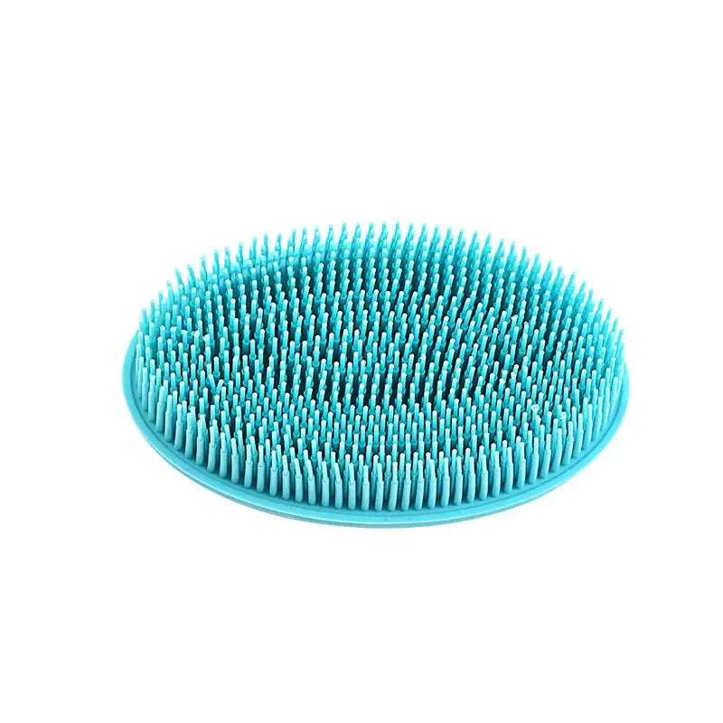 Light blue silicone loc lint remover brush with soft bristles, ideal for gently removing lint from locs and maintaining clean hair.