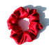 Floral pink 100% pure mulberry silk scrunchie with a delicate pattern. Large silk hair tie for a soft and stylish hair accessory.