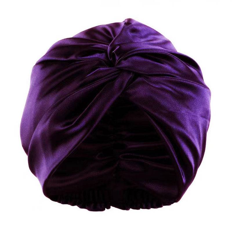 Silk Bonnet Amara De Luxe in deep purple, crafted from 100% Mulberry Silk. A stylish and protective headwrap for locs and natural hair.