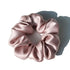 Sky blue 100% pure mulberry silk scrunchie. Large, soft silk hair tie for a smooth and elegant hair styling solution.