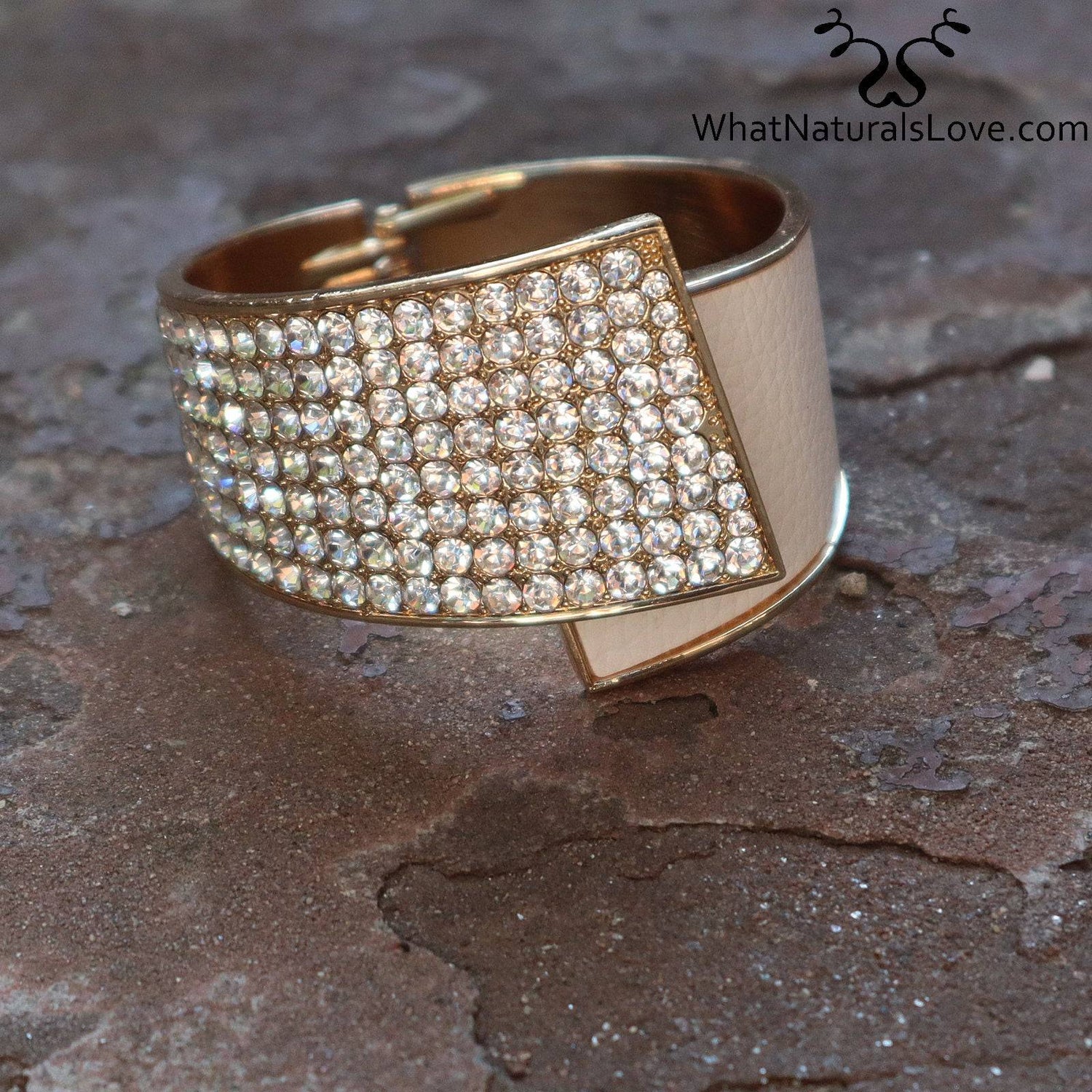 Close-up of a rhinestone hair cuff with gold-tone accents. A stylish and secure ponytail holder for locs, dreadlocks, braids, and curls.