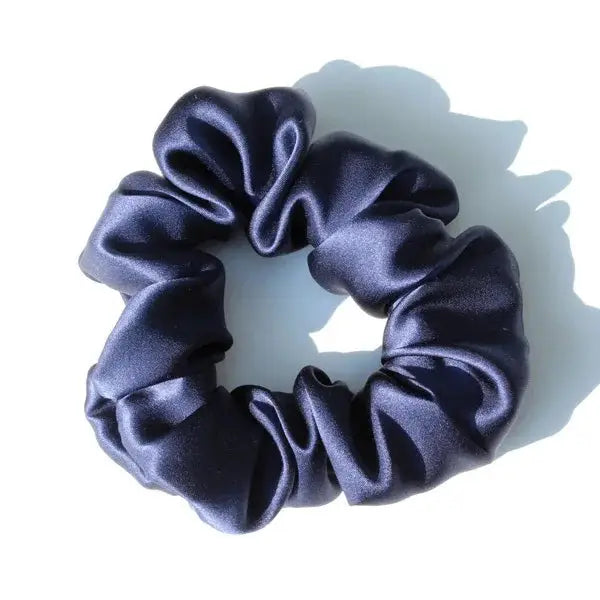 Leopard print 100% pure mulberry silk scrunchie. Large, soft silk hair tie for a bold and trendy hair accessory.