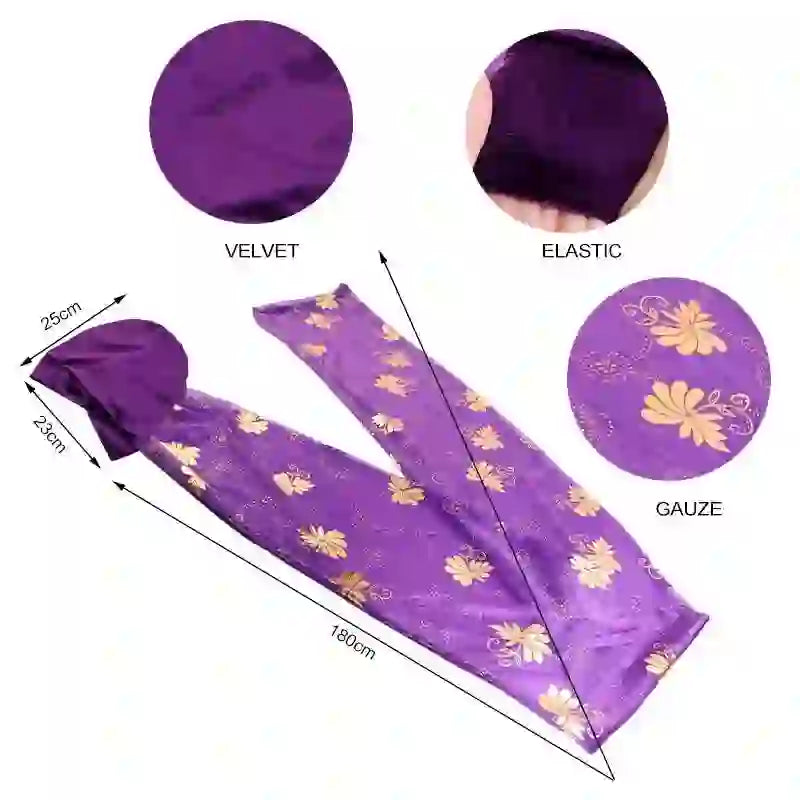 Detailed view of the Regal Amethyst Adorned Headwrap, showcasing velvet, elastic, and gauze materials with gold floral patterns. Stylish and comfortable headwear.
