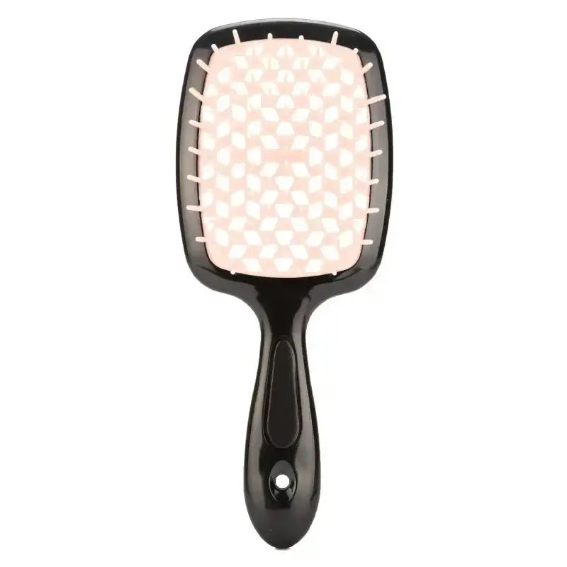 Clear detangling brush with a breathable design. Ideal for curly and 4C hair, ensuring smooth and breakage-free styling.