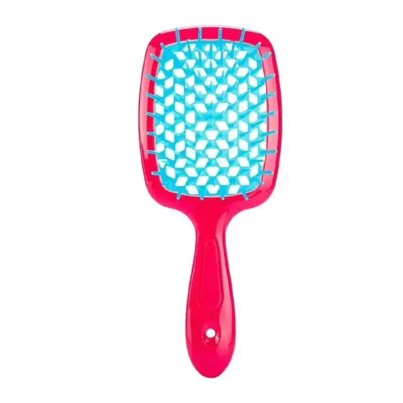 White detangling brush with mint green bristles for curly hair. Designed for pain-free detangling and reducing hair breakage.