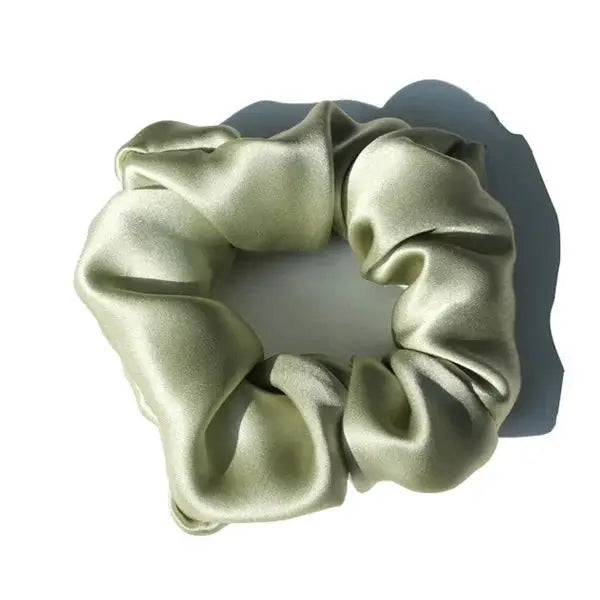 Royal blue 100% pure mulberry silk scrunchie. Large, soft silk hair tie for a bold and elegant hair styling option.