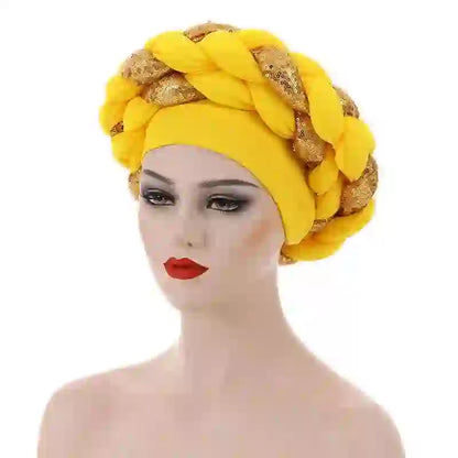 White Gele African turban with gold sequin details for women. A stylish and elegant headwrap for formal and cultural events.