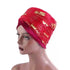 Red Regal Amethyst Adorned Headwrap featuring gold floral designs, elegantly wrapped on a mannequin. A fashionable headwear choice for women.