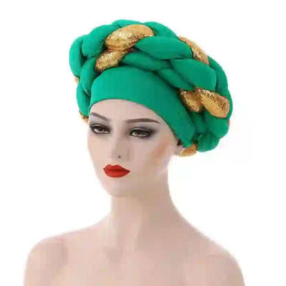Royal blue Gele African turban with gold sequin embellishments for women. A bold and elegant headwrap for festive occasions.
