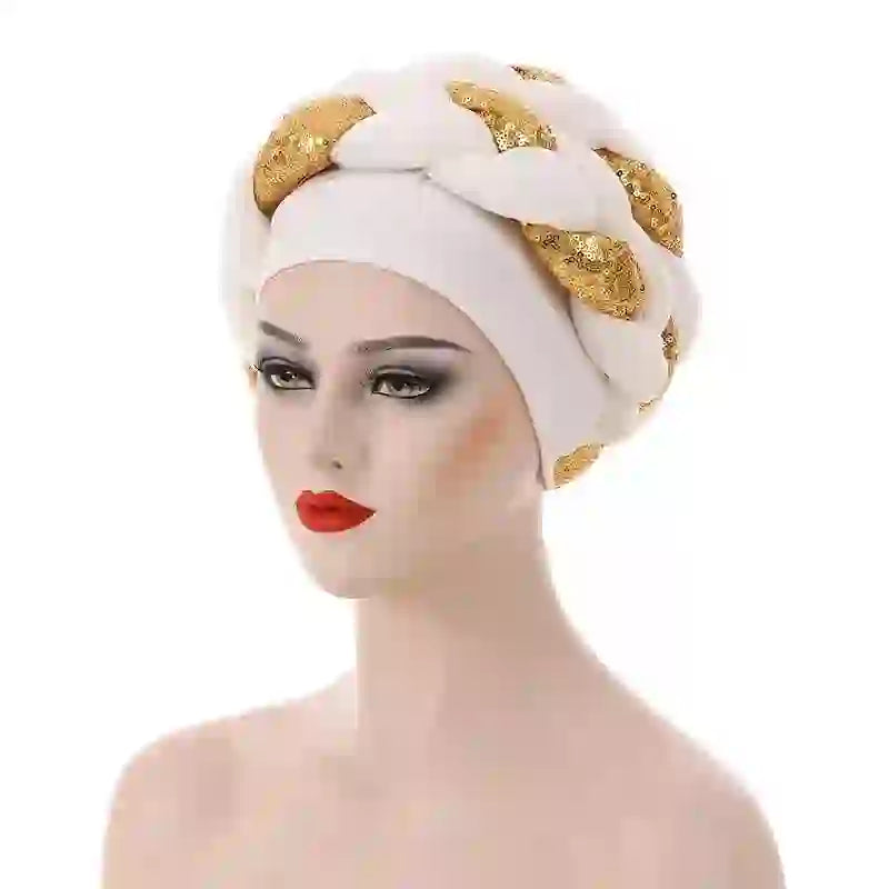 Black Gele African turban with gold sequin embellishments for women. A glamorous headwrap for festive and cultural occasions.
