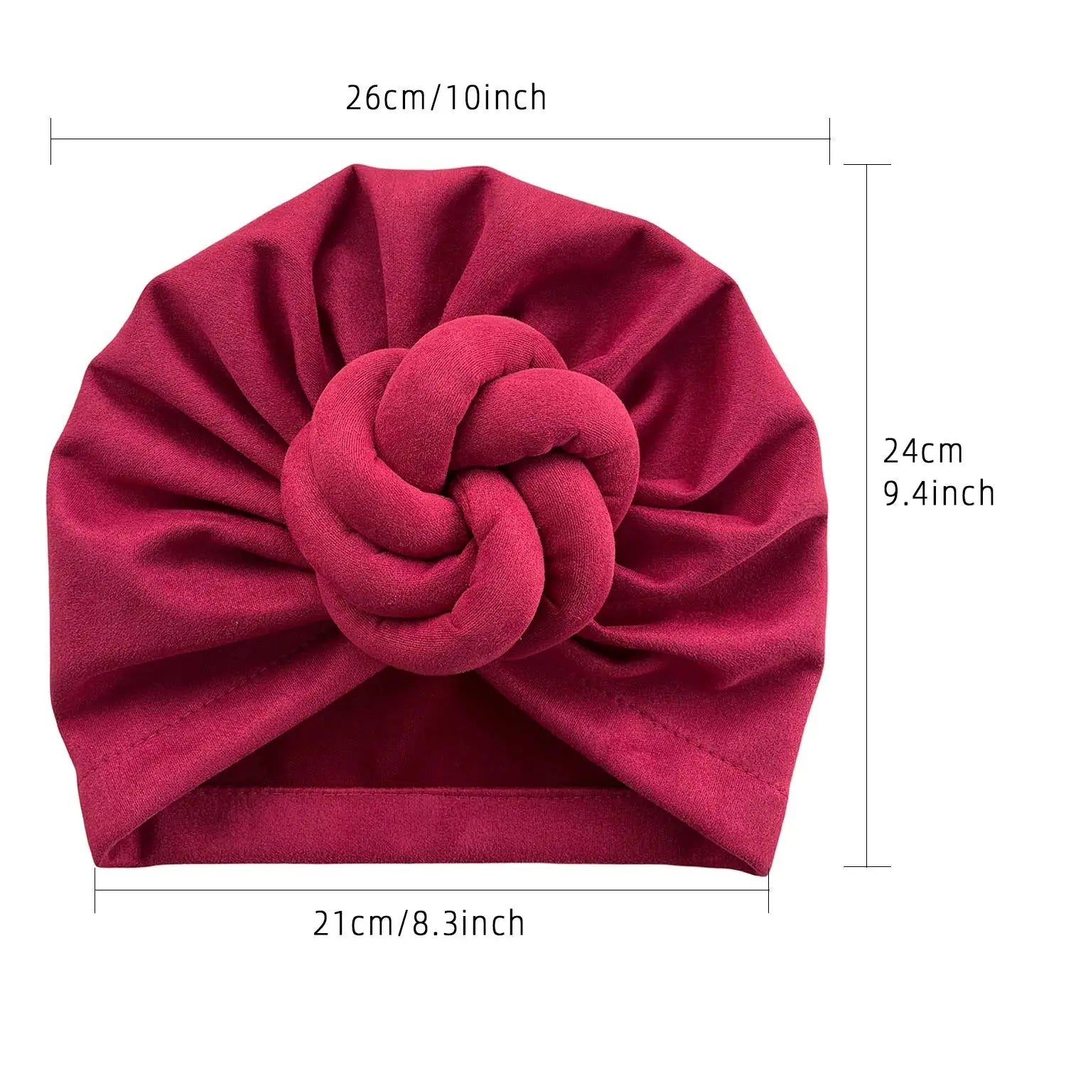 Size dimensions of the soft knotted turban headwrap, measuring 26cm in width, 24cm in height, and 21cm in opening width.