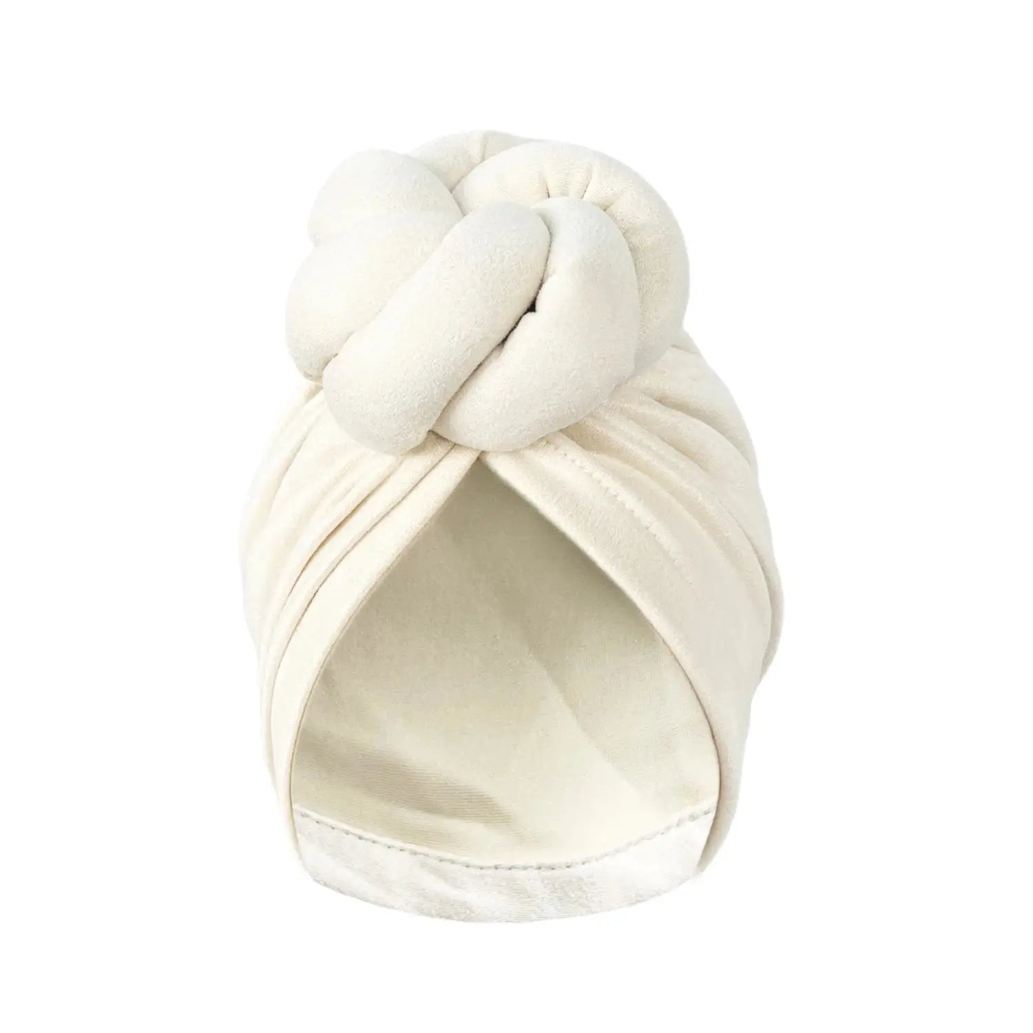 Beige soft knotted turban headwrap with a smooth fabric and stylish knot, offering a sophisticated look.
