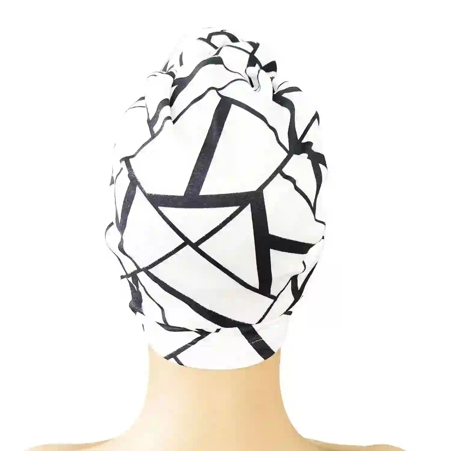 Back view of a black and white geometric patterned knot turban headwrap, displaying its full coverage and stylish design.