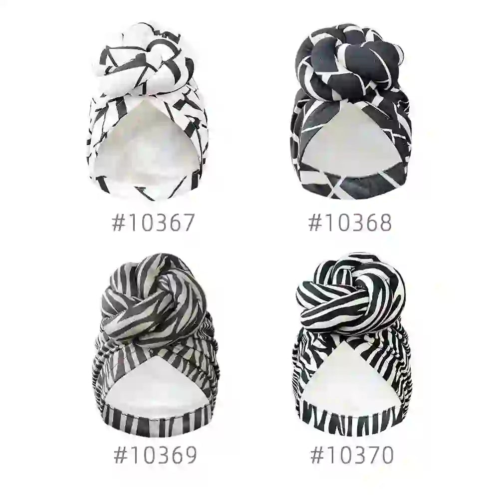 Four different patterned knot turban headwraps labeled with unique design numbers, showcasing stylish geometric prints in black and white.