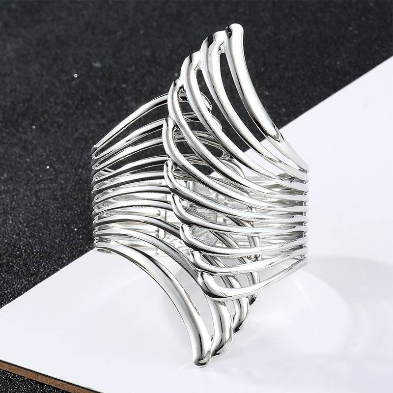 Silver Aurora Wing Cuff with a sleek metallic finish, designed for locs, sisterlocks, dreadlocks, and braids. A stylish and adjustable hair accessory.